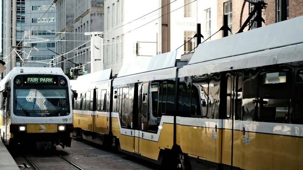 Two light-rail trains side by side