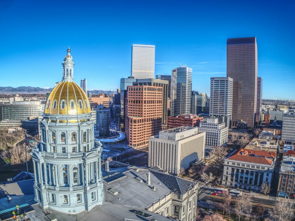 Downtown Denver office towers and the Colorado State Capitol building