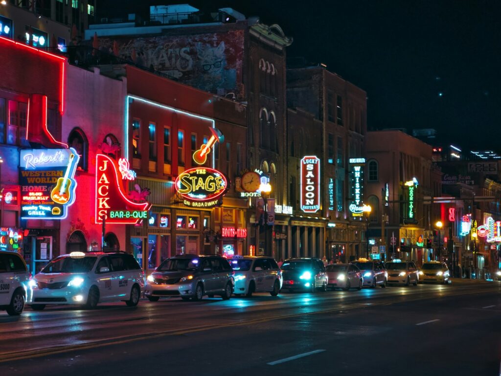 Traffic on a downtown Nashville street at night