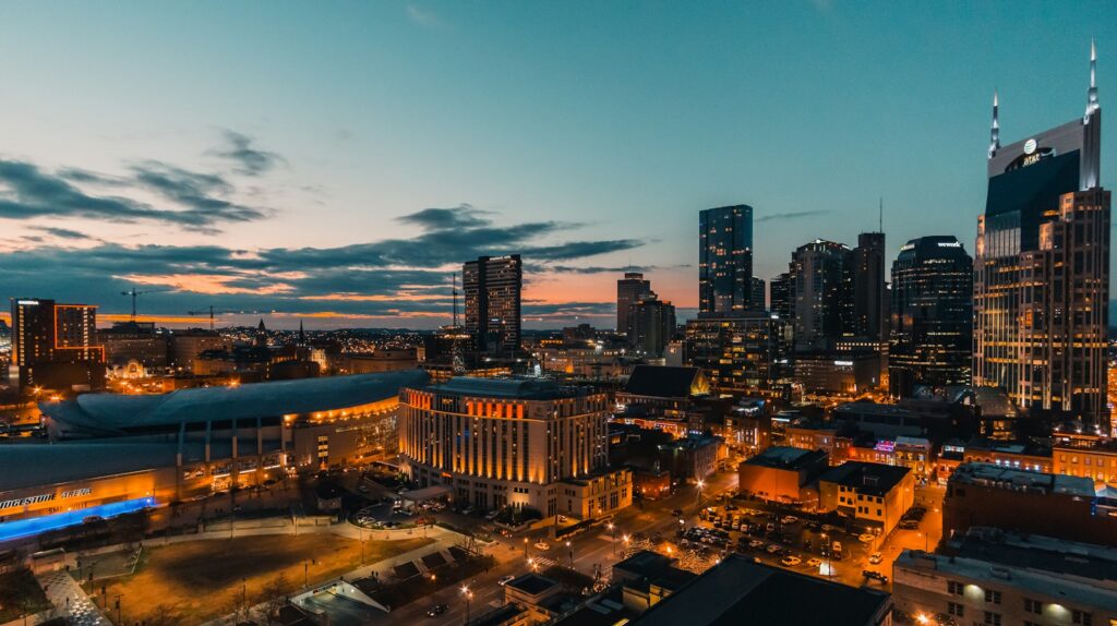 Nashville skyline at dusk with downtown towers lit up