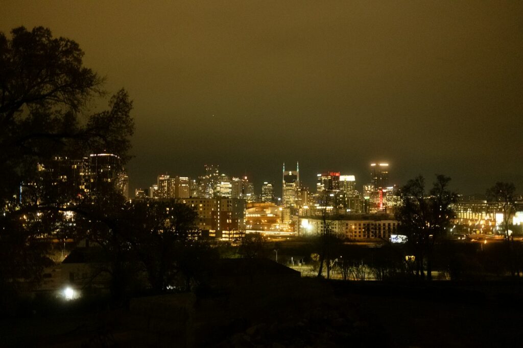 Nashville skyline under dark storm clouds
